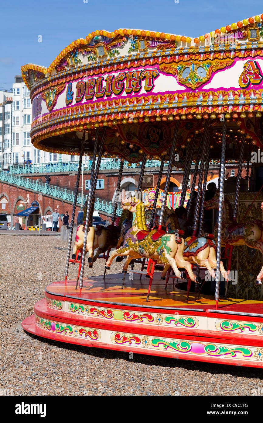 Children's carousel on Brighton Beach, England Stock Photo