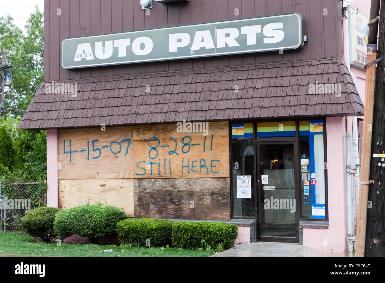 A local business in the Village of Mamaroneck, New York, boardedup to