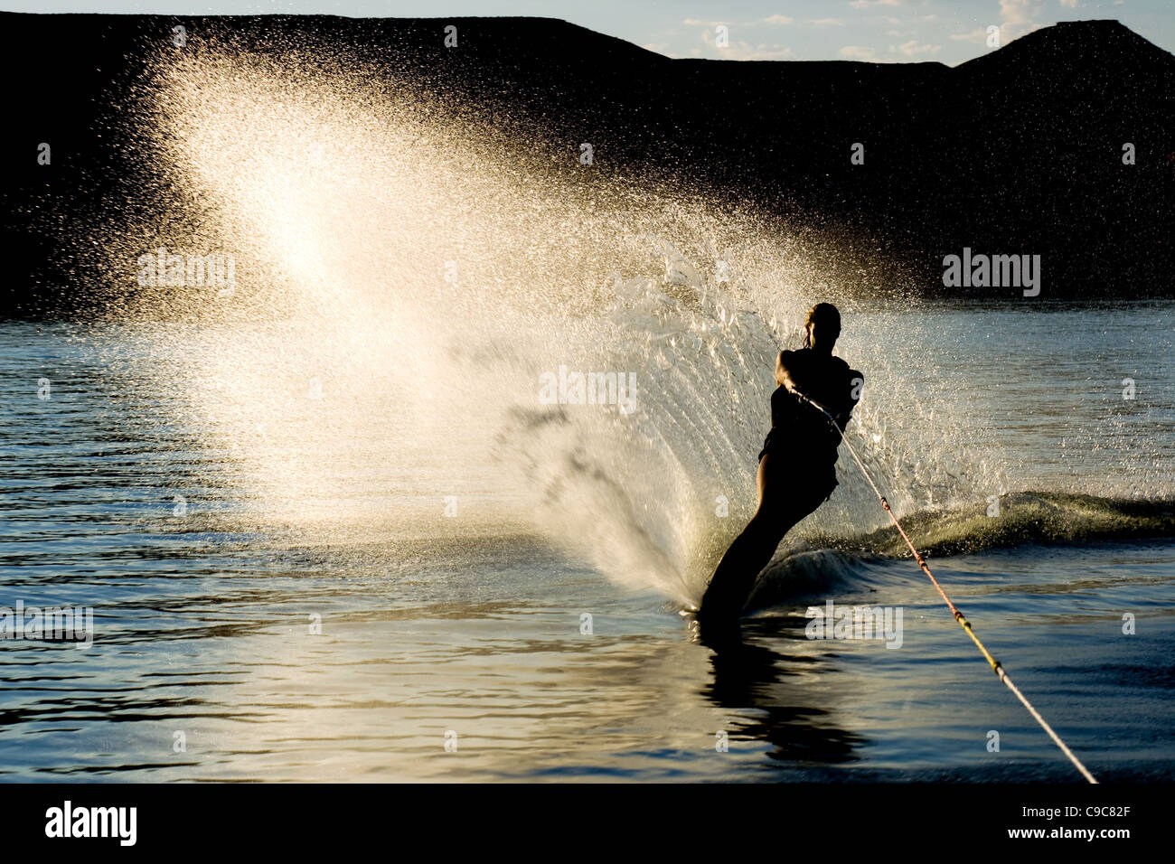 Slalom water skiing sunrise hires stock photography and images Alamy