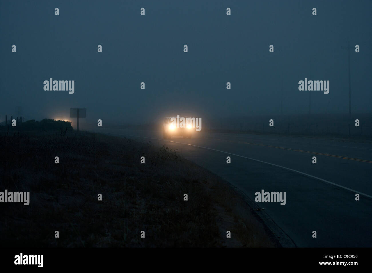 Automobile Headlights in the Fog Stock Photo - Alamy
