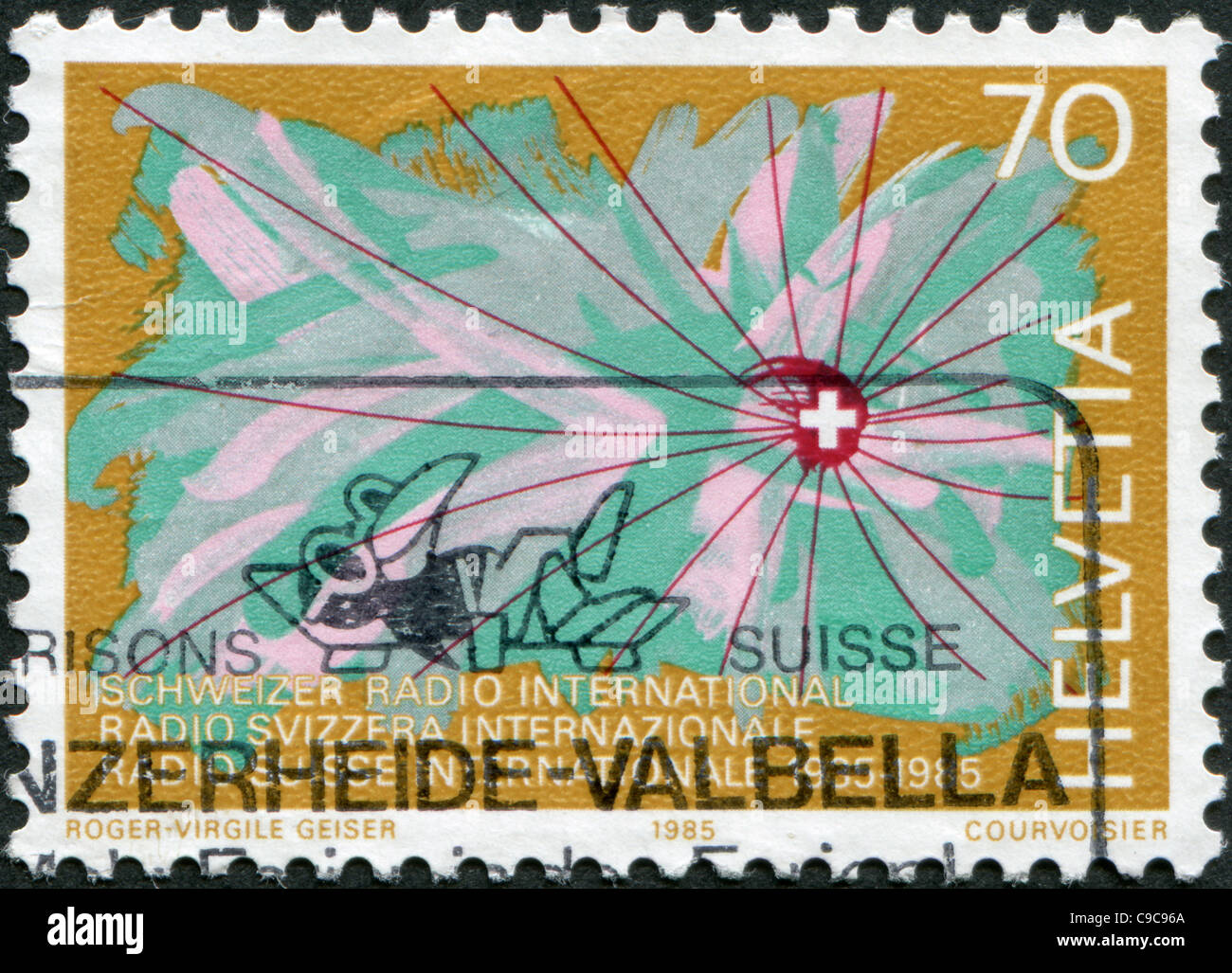 SWITZERLAND 1985: A stamp printed in Switzerland, is dedicated to the 50th anniversary of the Swiss radio Stock Photo