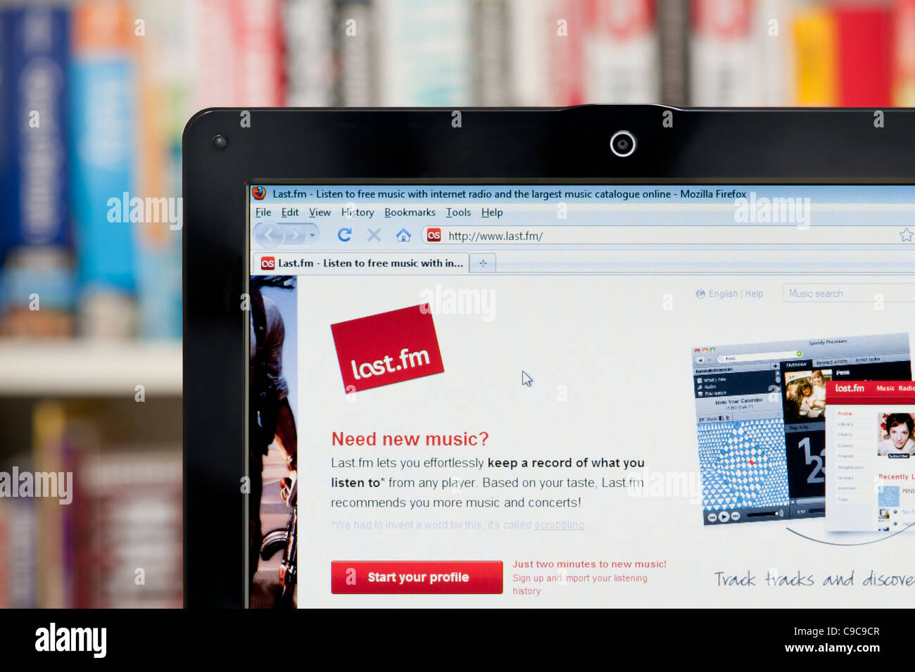 The Last.fm website shot against a bookcase background (Editorial use only: print, TV, e-book and editorial website). Stock Photo