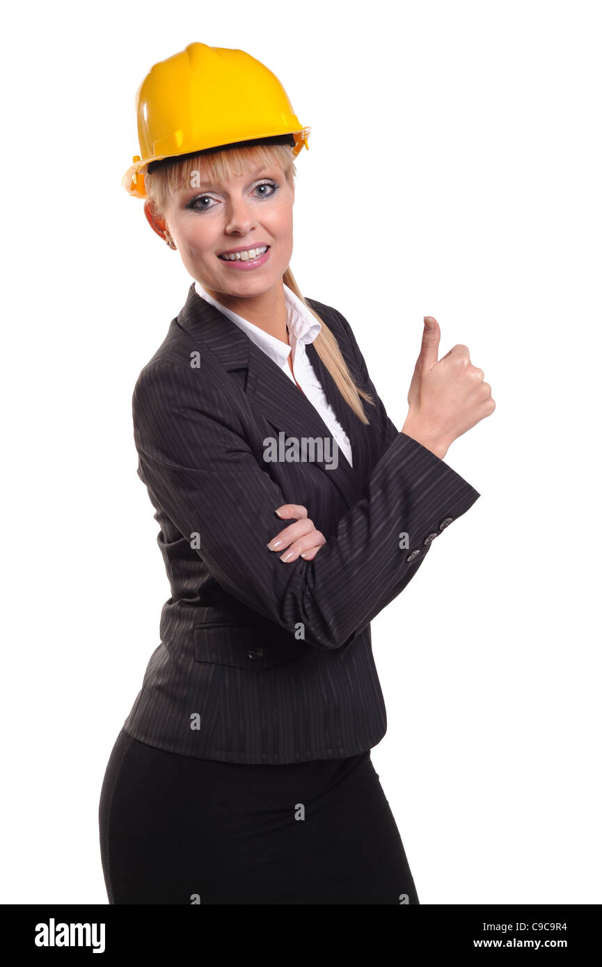 Business Lady in safety hat giving the thumbs up sign Stock Photo