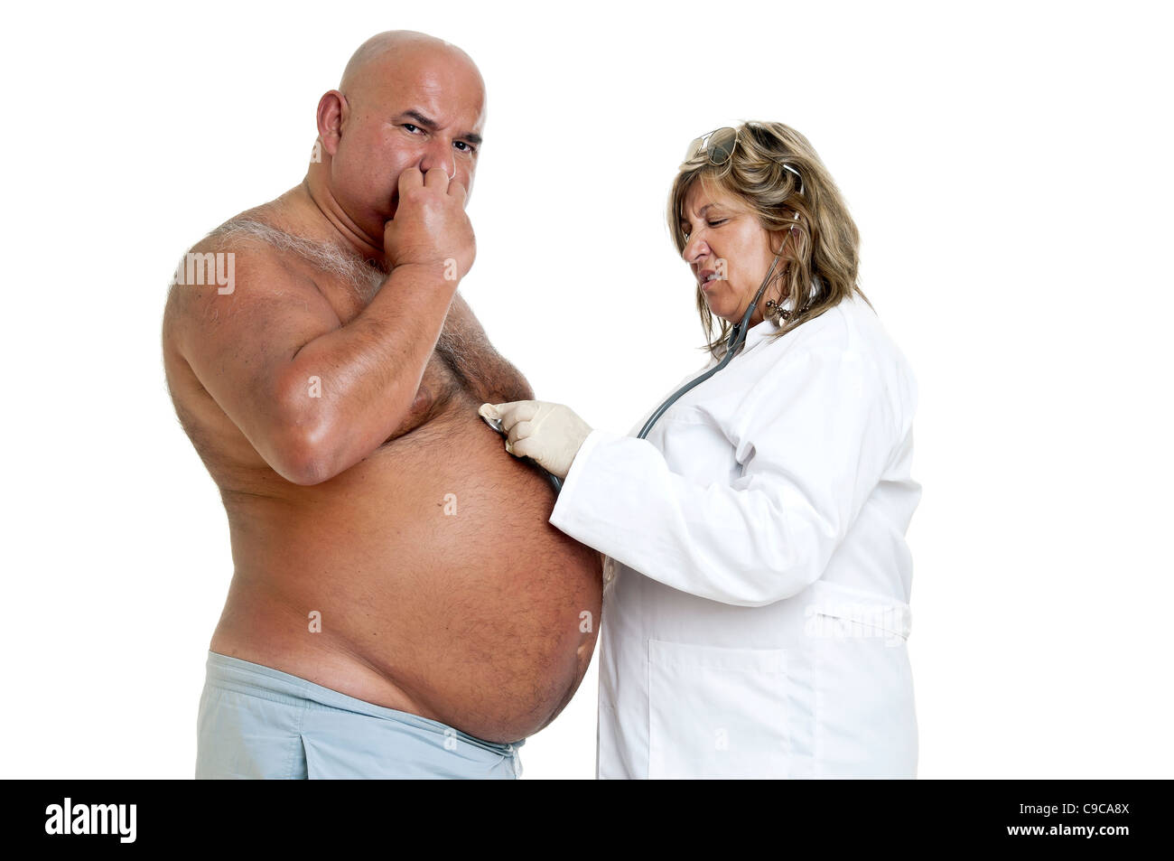 Large male patient with big belly and doctor Stock Photo
