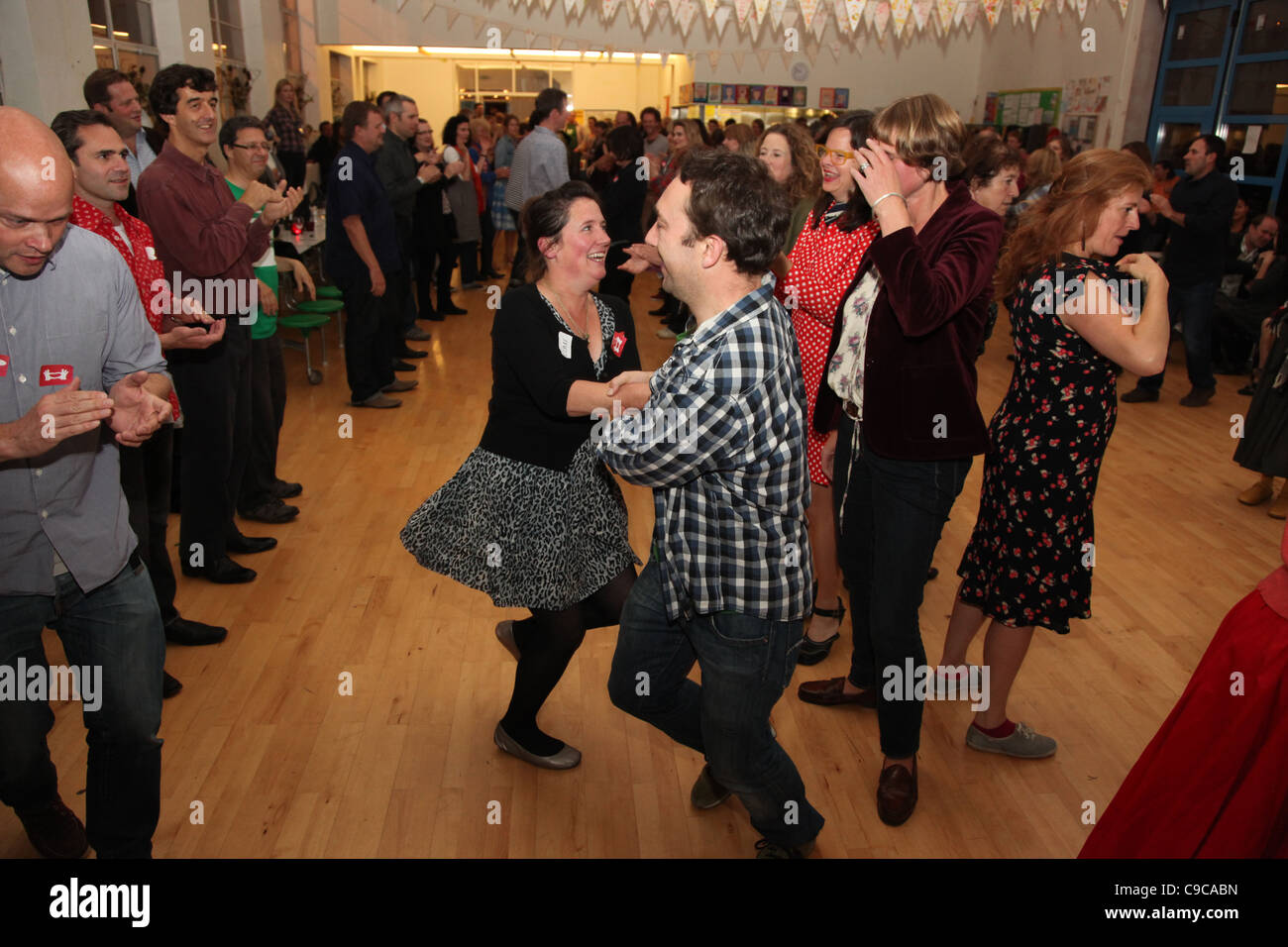 A community barn dance in a organised by a Transition Town (Kensal to Kilburn in London). Stock Photo