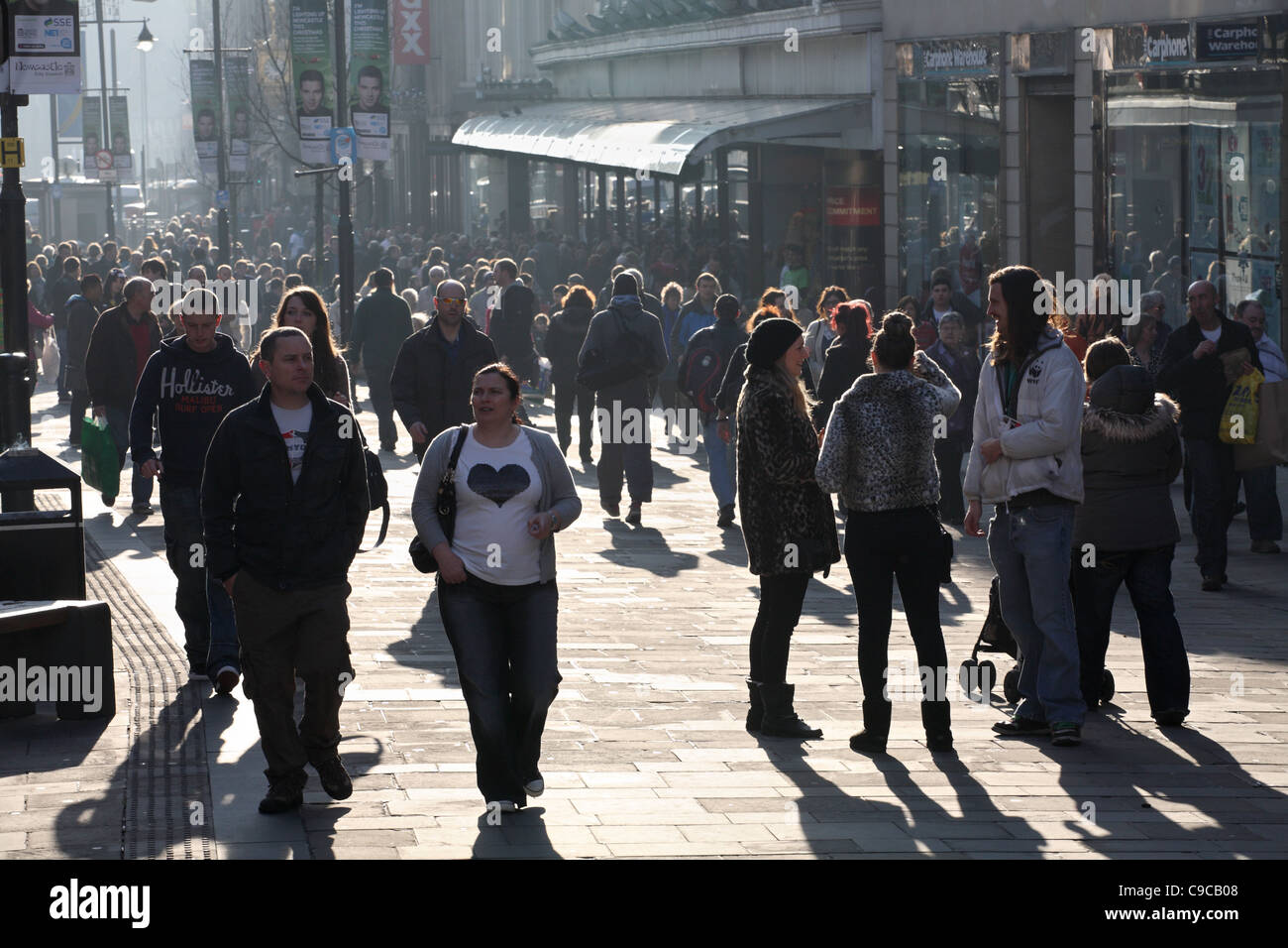 Shoppers walking down Northumberland Street, Newcastle, north east England UK Stock Photo