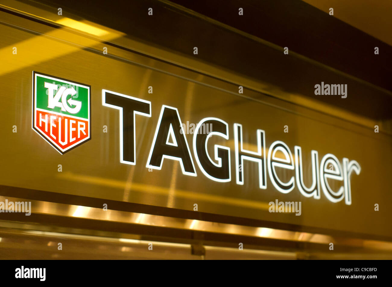 TAG Heuer store sign, in Singapore shopping center Stock Photo Alamy