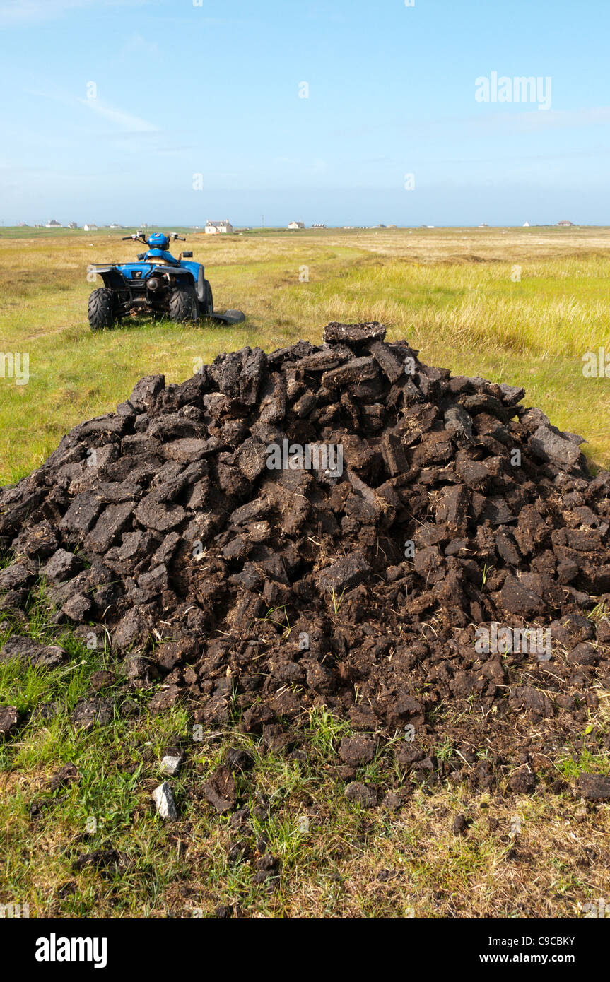 Peat cutting on the Hebridean island of South Uist. Stock Photo