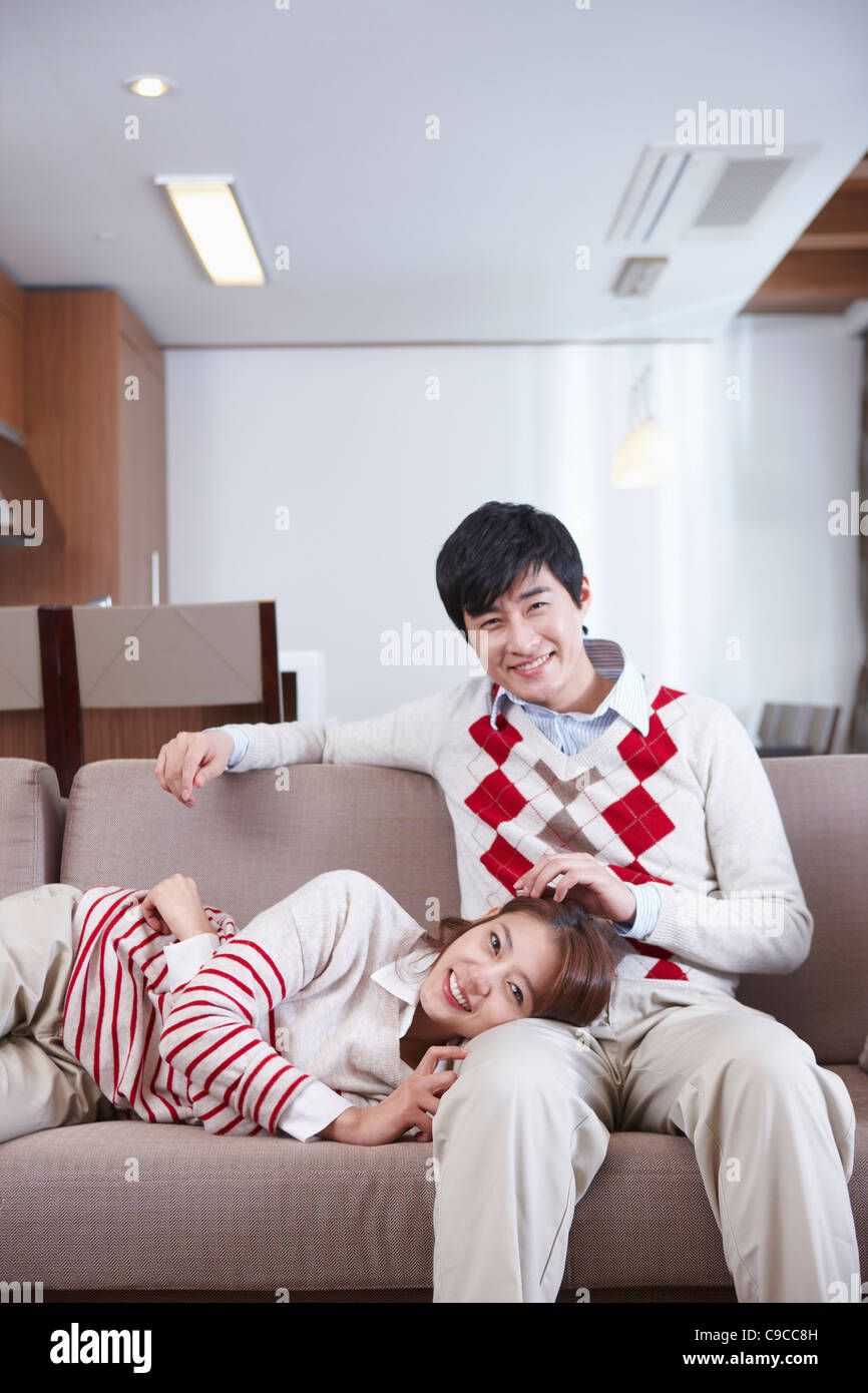 Woman sitting on man lap hi-res stock photography and images - Alamy