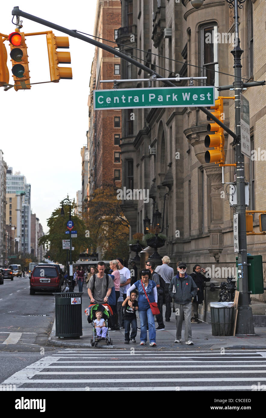 Pedestrian crossing and yellow traffic lights by the Dakota building