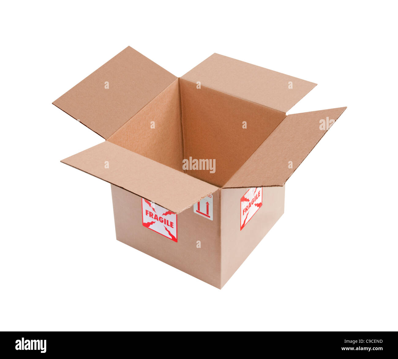 Open, empty corrugated cardboard box with fragile stickers stuck on, isolated Stock Photo