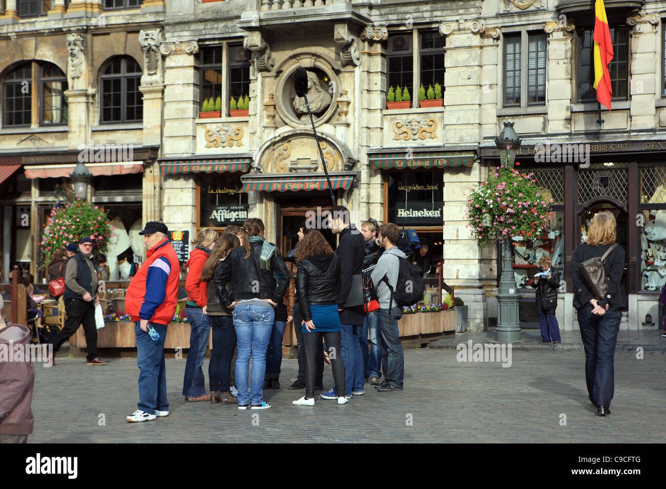 TV film crew interviewing people in the Grand Place Brussels, Belgium Stock Photo