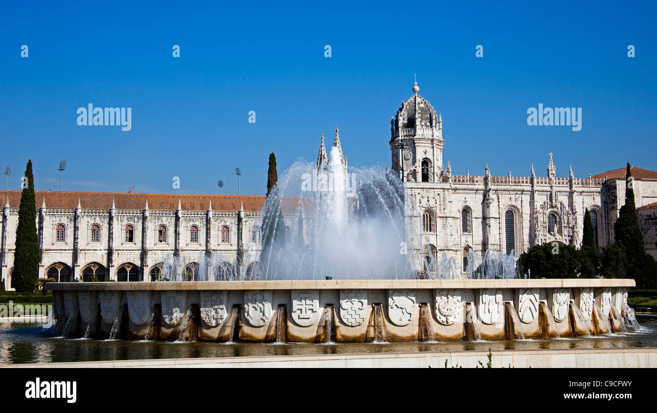 Fountain in Praca do Imperio, with Mosteiro dos Jeronimos Belem, Portugal Europe Stock Photo