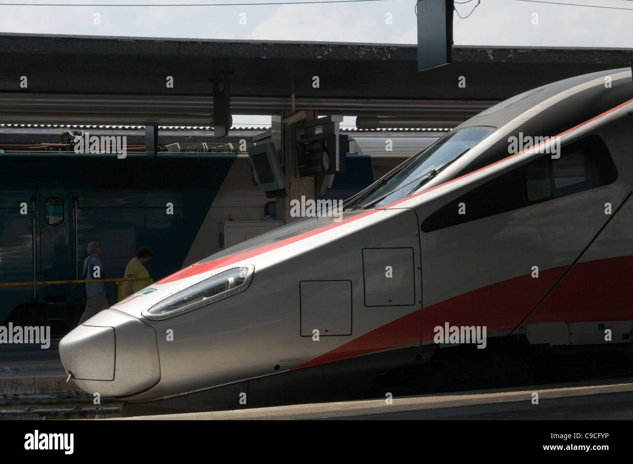 high speed train trains rail italy italian Frecciarossa” Red Arrow  railways station stations swoppy sleek aerodynamic Stock Photo