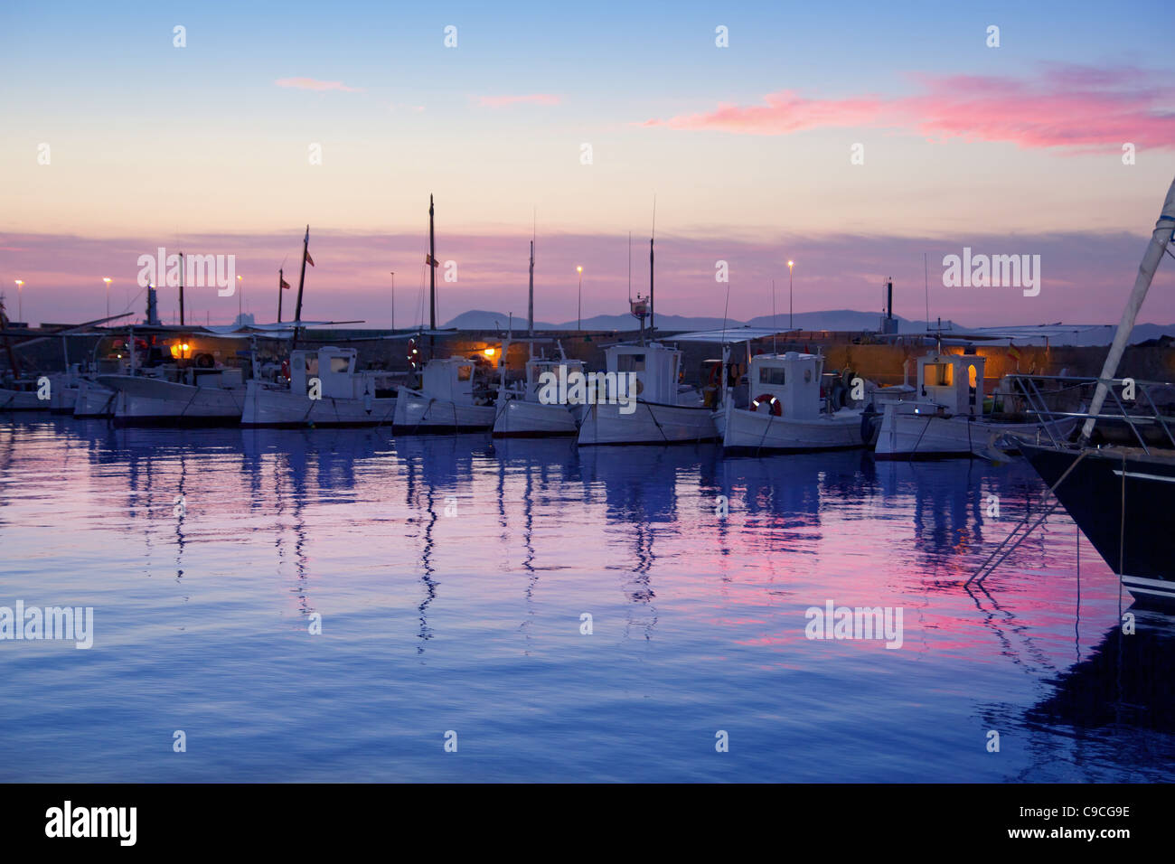 Formentera pink sunset in port marina of Mediterranean Balearic Stock Photo