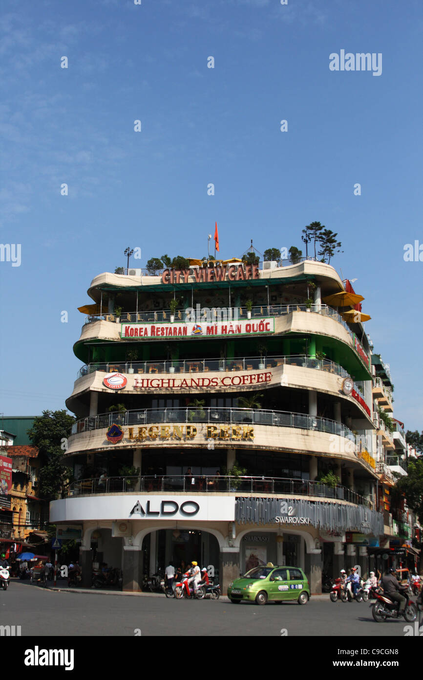 building at north end of Hoan Kiem lake in Hanoi with cafes and
