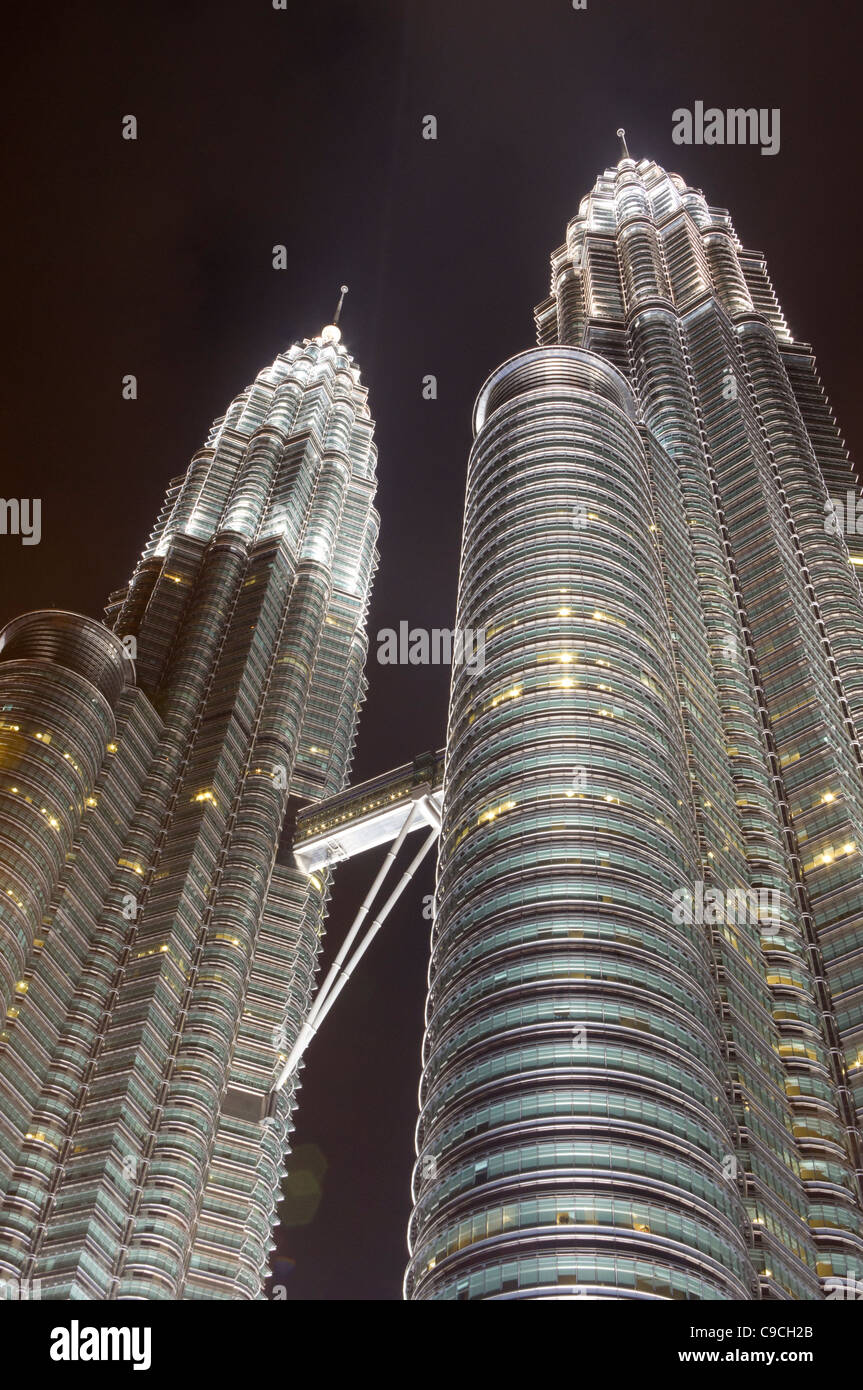 Petronas twin towers in Kuala Lumpur at night time. Stock Photo