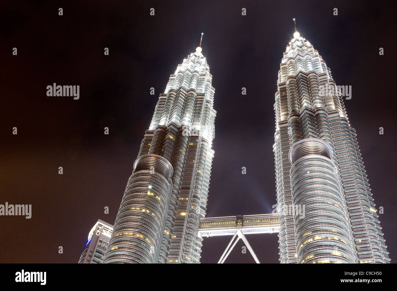 Petronas twin towers in Kuala Lumpur at night time. Stock Photo