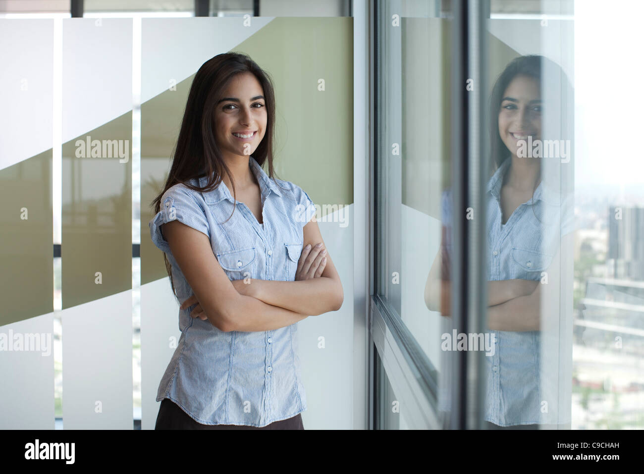 Cheerful pretty woman standing hi-res stock photography and images - Alamy