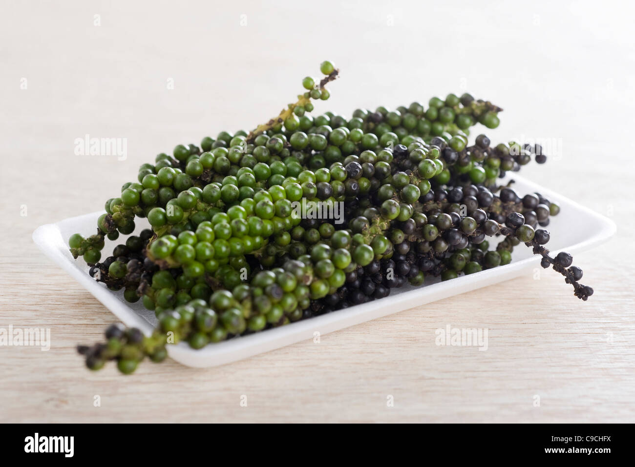 Fresh green peppercorns Stock Photo Alamy