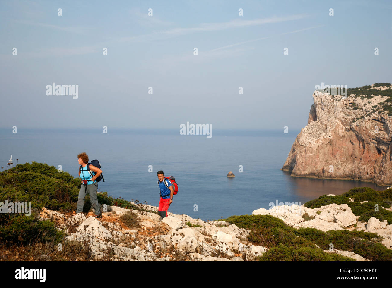 People hiking on the the Capo Caccia, Alghero, Sardinia, Italy. Stock Photo