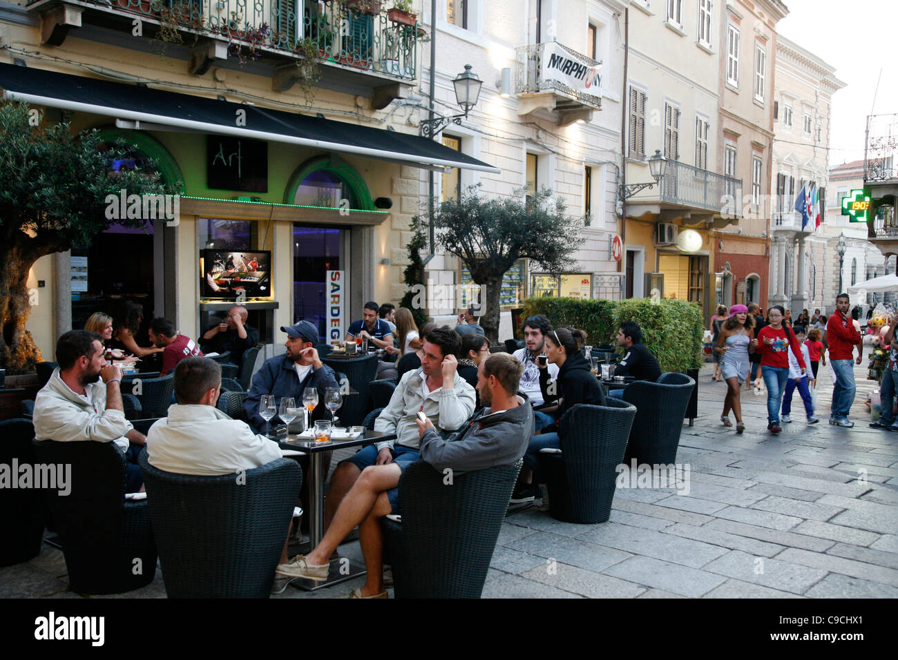 People sitting at the Art Cafe, La Maddalena, Sardinia, Italy. Stock Photo