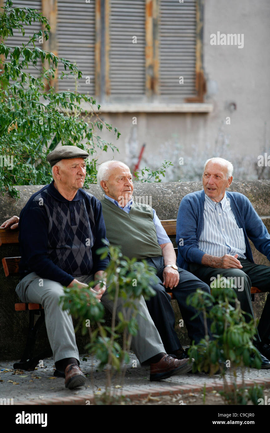 Elderly men, Bosa, Sardinia, Italy. Stock Photo