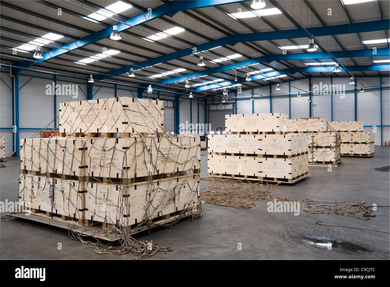 Ammunition cargo being passed through x-ray and loaded at Kent (Manston) International Airport, bound for Afghanistan Stock Photo