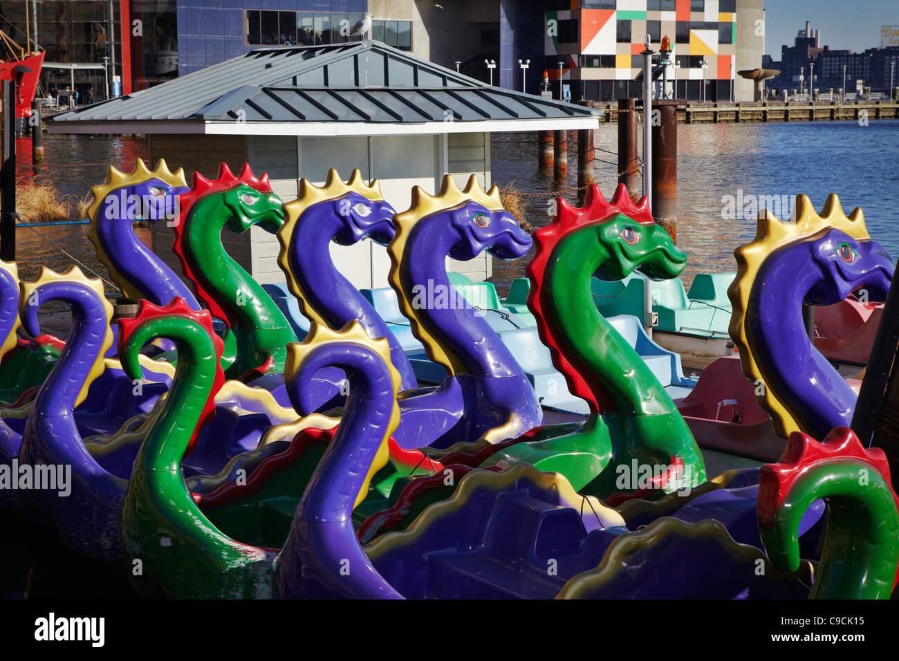 Sea serpent peddle boats moored at the Inner Harbor, Baltimore, Maryland. Stock Photo