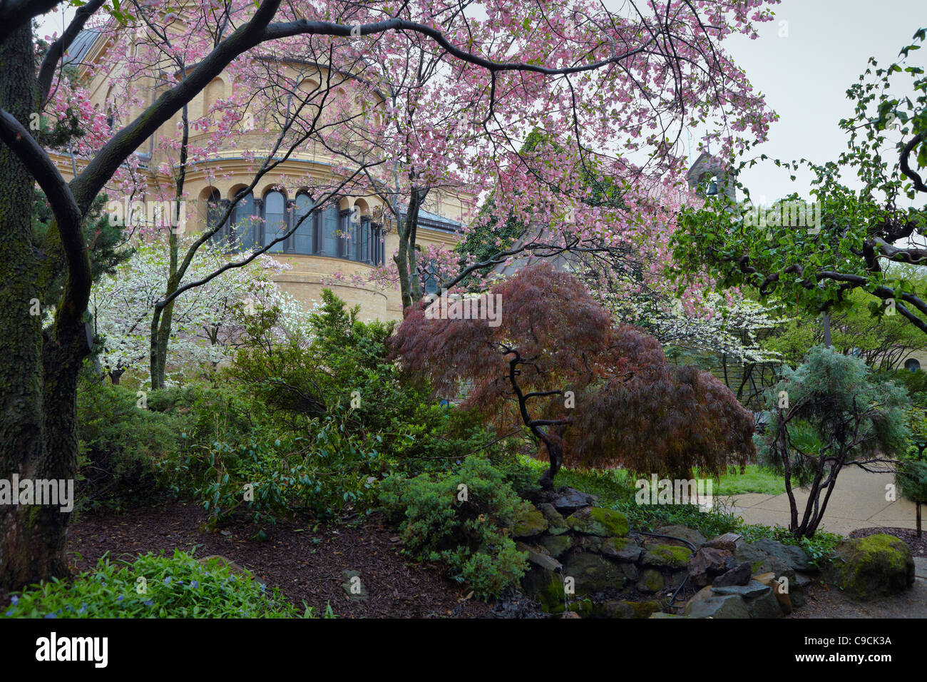 Looking towards the monastery church from the garden of the Franciscan Monastery, Washington, DC. Stock Photo