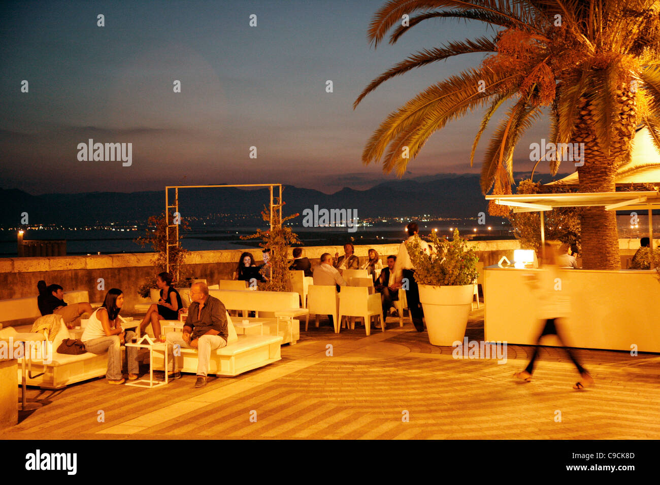 People sitting at Caffe Libarium Nostrum in the Castello area, Cagliari, Sardinia, Italy. Stock Photo