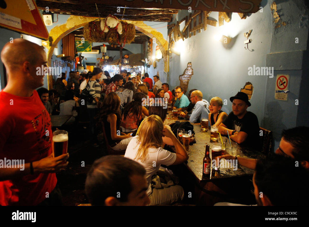 Young people at Oghorn's Bar in coso Vittorio Emanuele st., Cagliari, Sardinia, Italy. Stock Photo