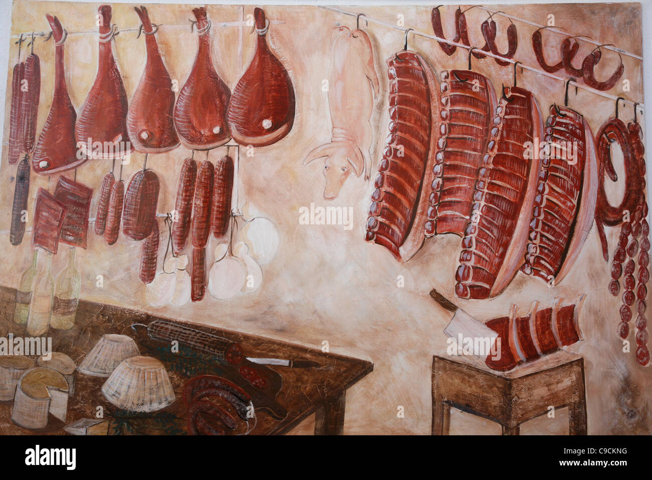 Wall painting on a butcher shop, San Pantaleo village, Sardinia, Italy. Stock Photo