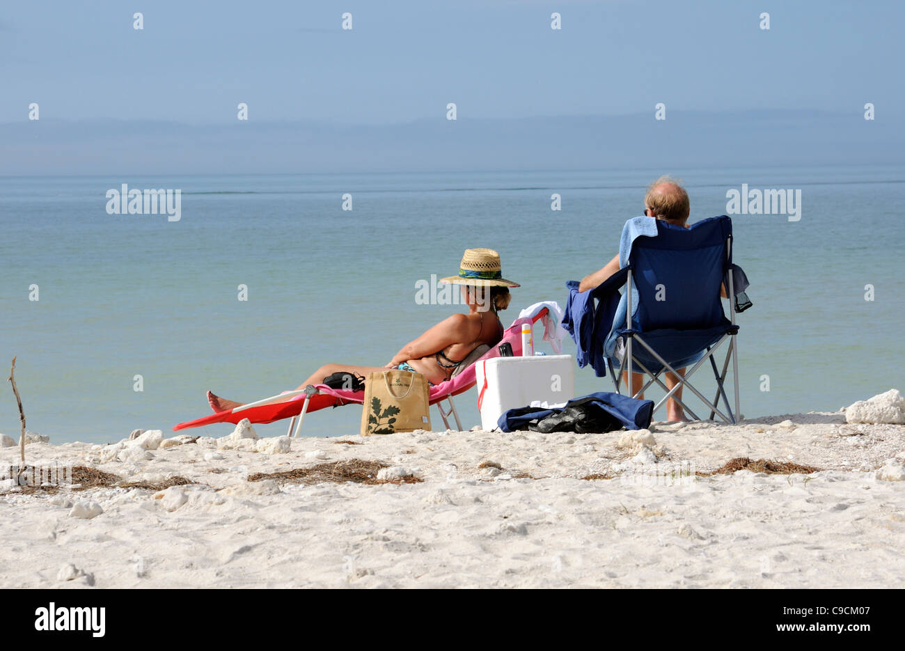 Couple sunbathing beach back view hi-res stock photography and images -  Alamy