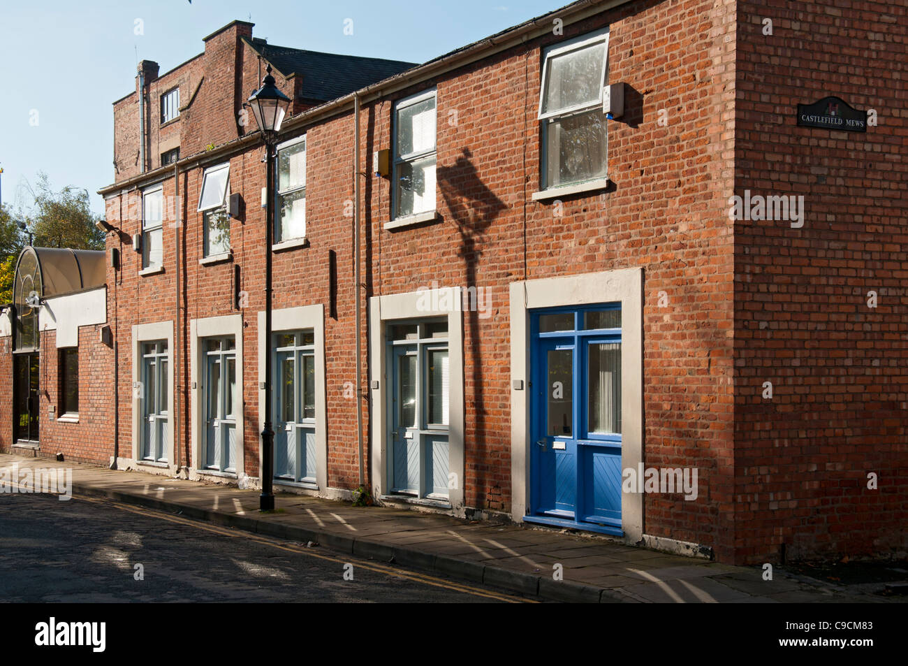 Small terraced houses at Castlefield Mews, Stone Street, Manchester