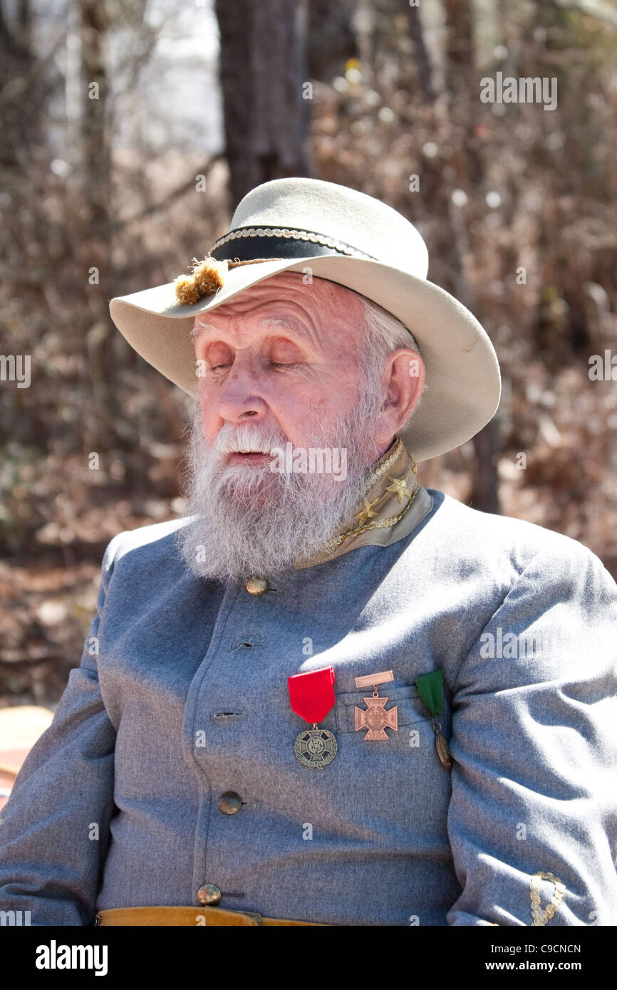Confederate soldier in camp at a southern civil war reenactment Stock Photo