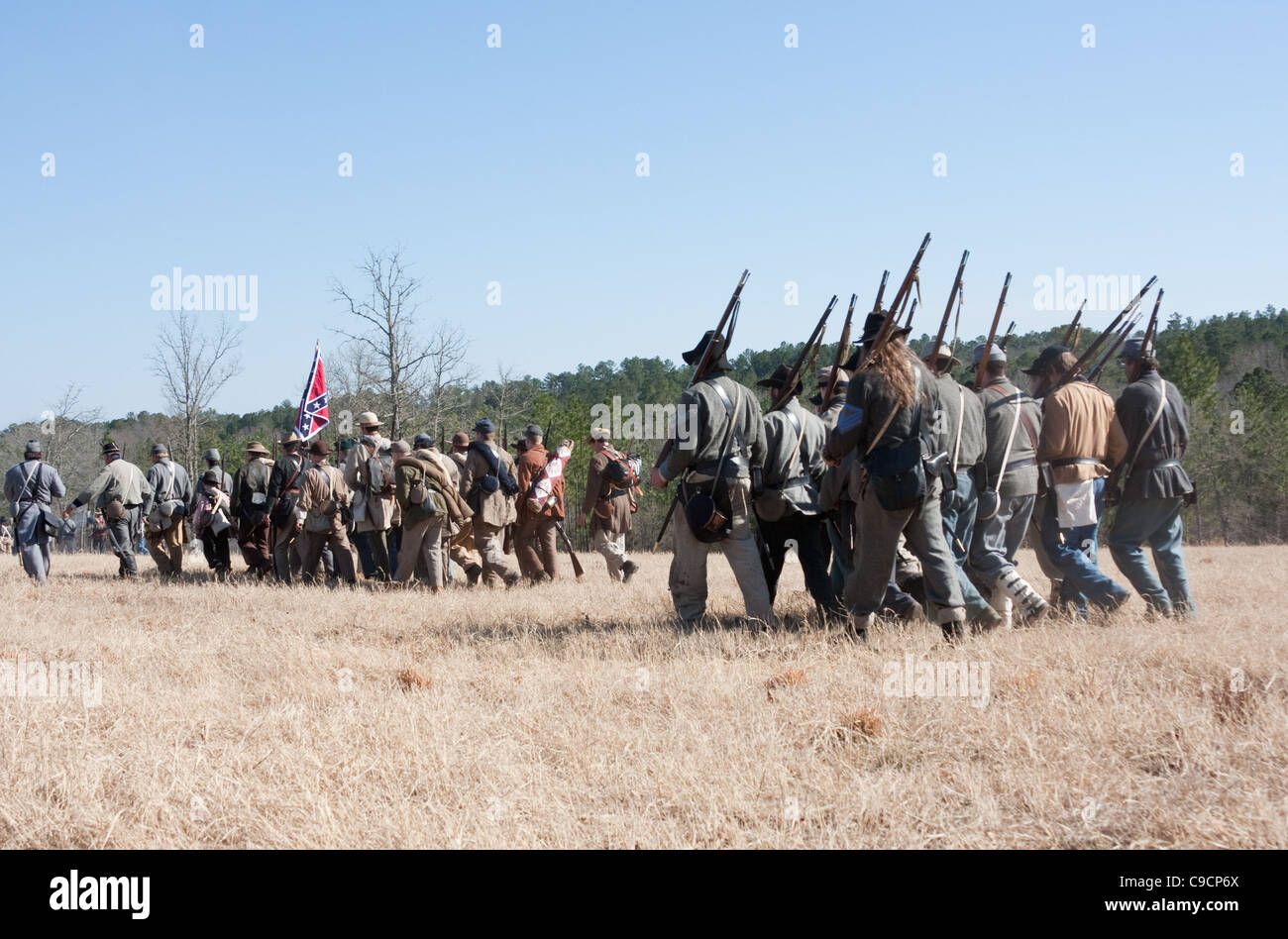Soldiers marching into battle at a civil war reenactment Stock Photo