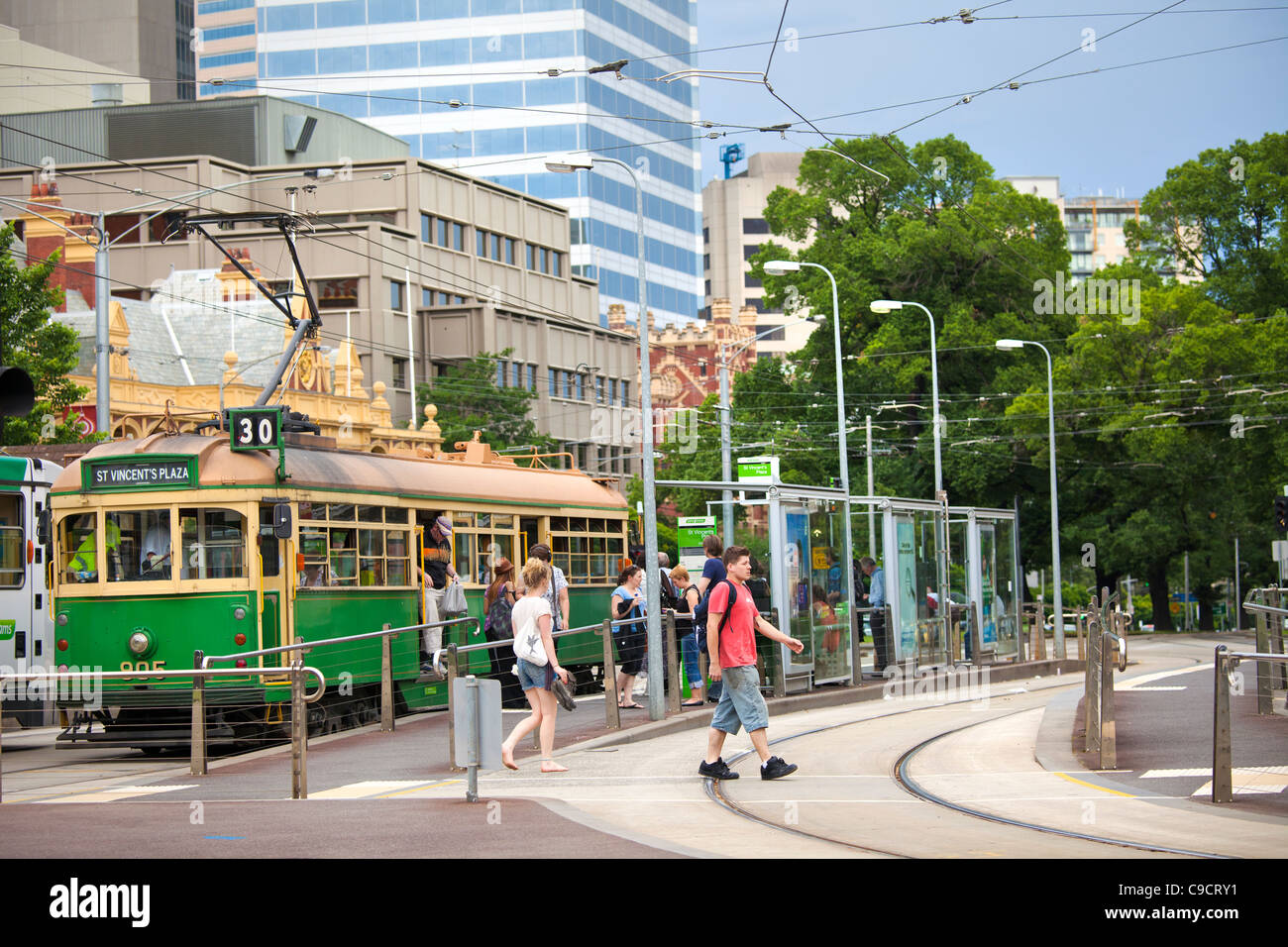 Sunny Melbourne day on the City public transport systems shown free tourist trams to the docklands. Stock Photo