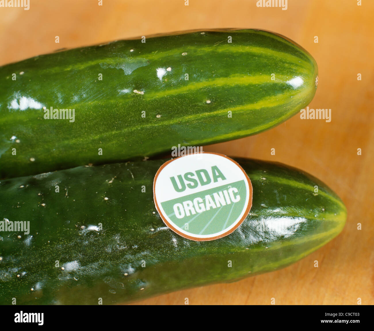 Organically grown cucumbers with USDA label showing the meet standards
