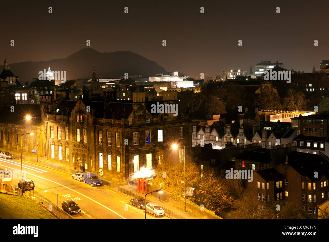 View of Johnston Terrace with Arthur's Seat in the background photographed at night from Edinburgh Castle, Scotland. Stock Photo