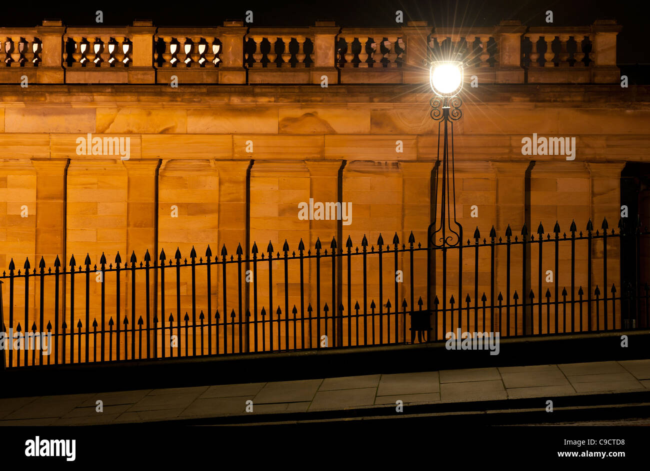 Ornate street lighting photographed after dark on The Mound near