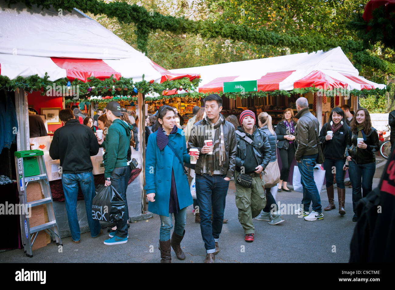 Shoppers browse the Union Square Holiday Market in New York Stock Photo