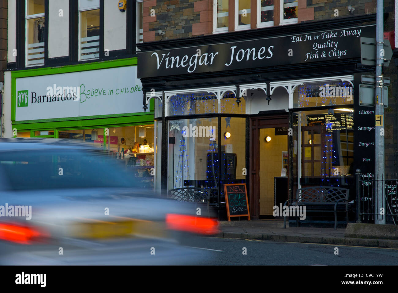 Barnardo's charity shop and Vinegar Jones fish & chip shop, Bowness