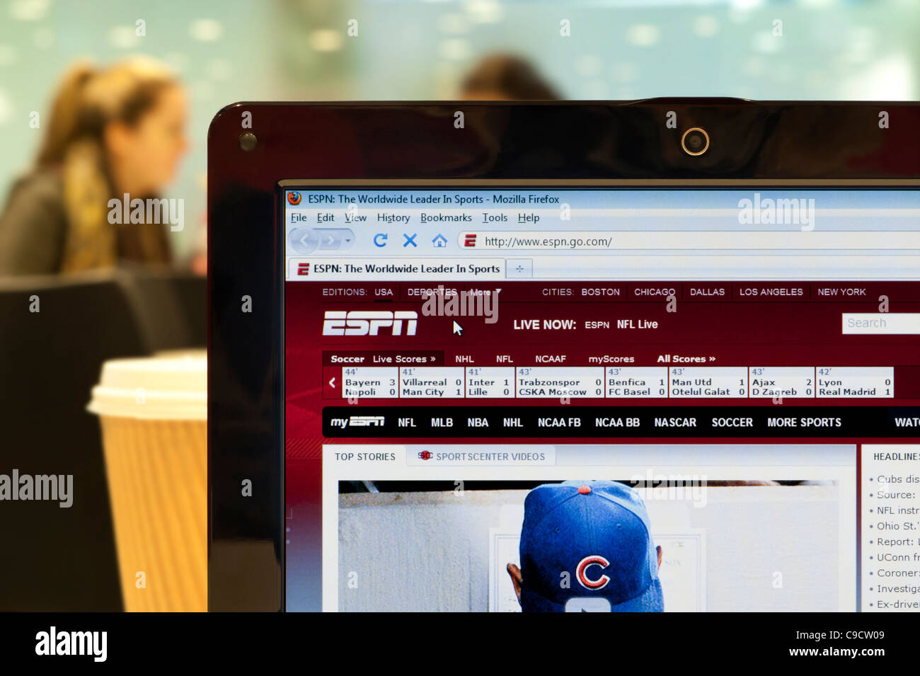 The ESPN website shot in a coffee shop environment (Editorial use only: print, TV, e-book and editorial website). Stock Photo