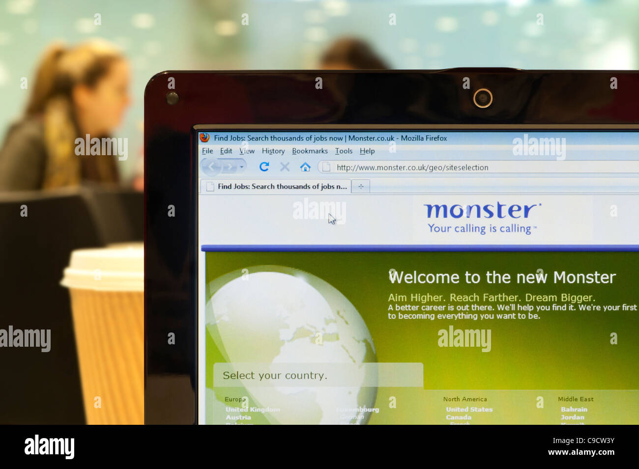 The Monster website shot in a coffee shop environment (Editorial use only: print, TV, e-book and editorial website). Stock Photo