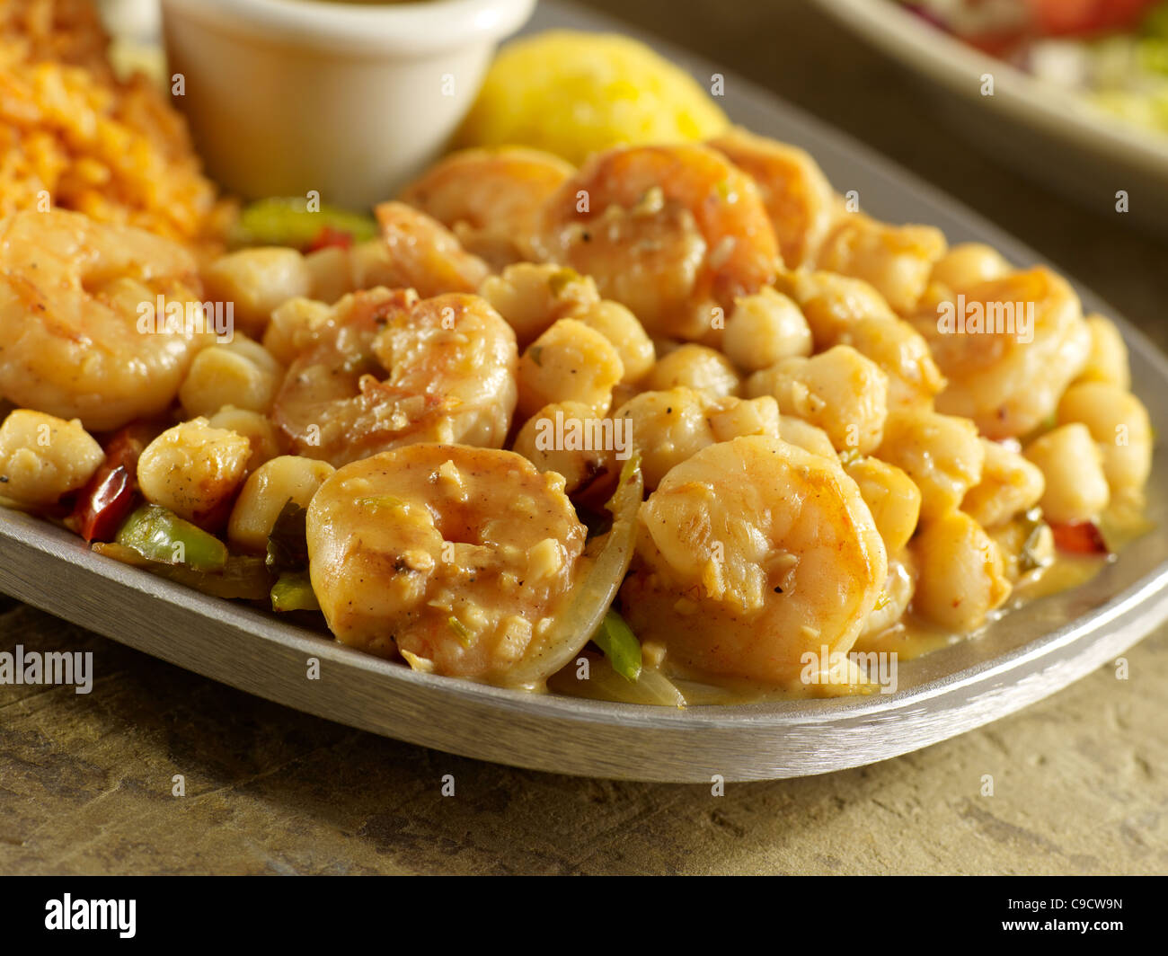 Shrimp and scallop fajitas over vegetables Stock Photo Alamy