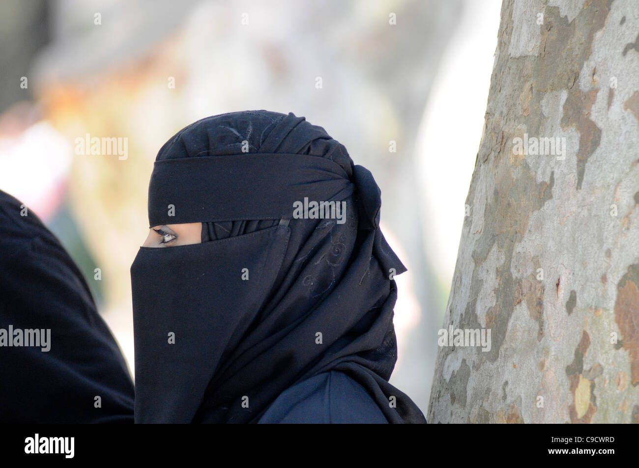 Muslim woman wearing black burka. Istanbul, Turkey Stock Photo
