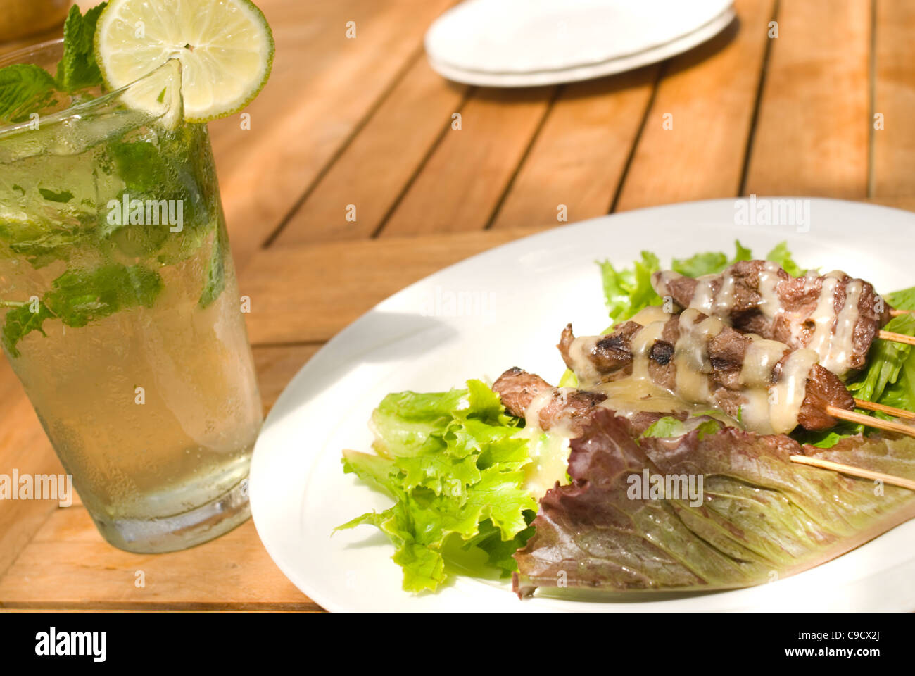Fine Dining in a Tropical Resort. A Mojito and Chicken Satay in Kauai