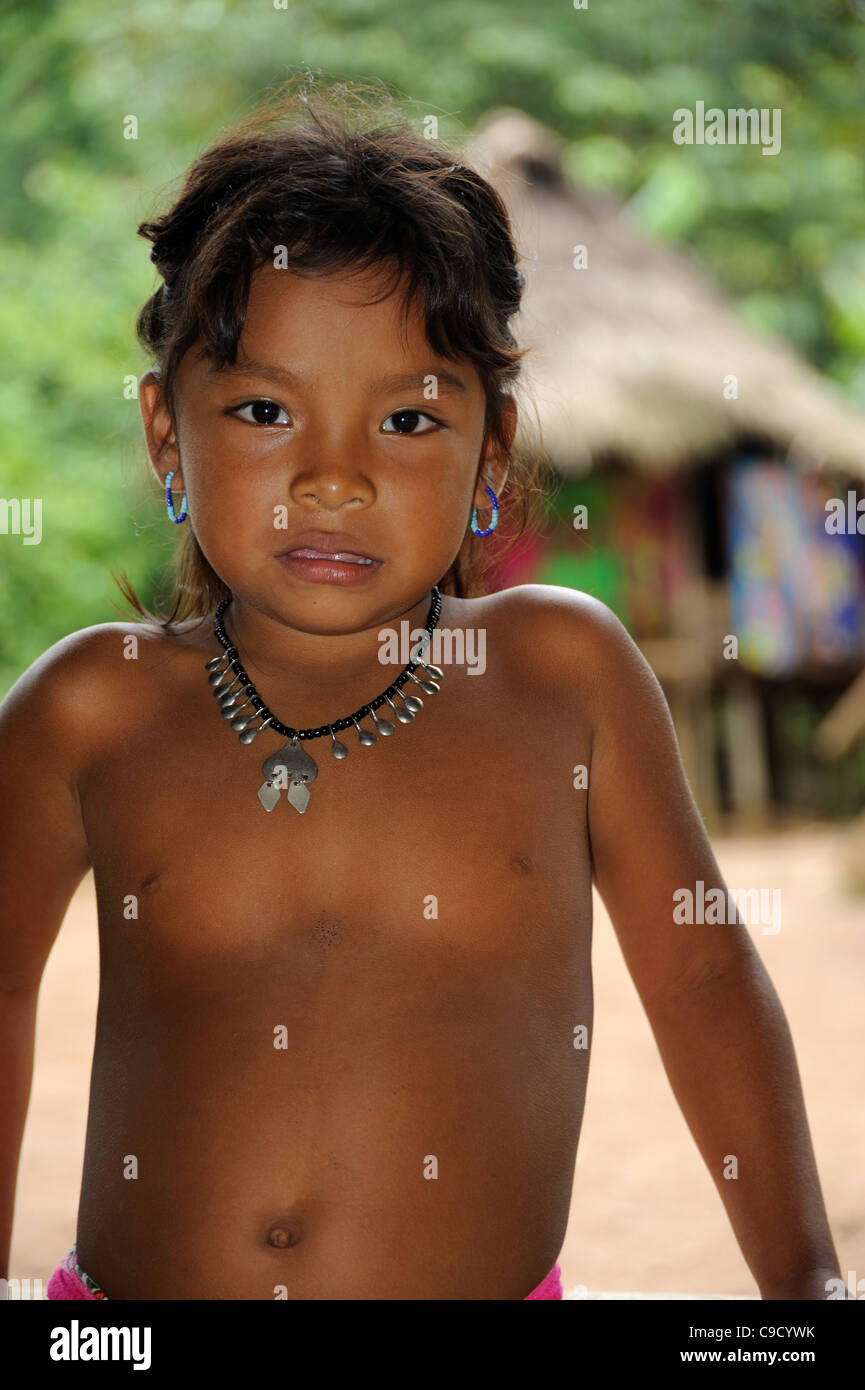 Embera indian little girl wearing silver necklace and earrings Stock Photo