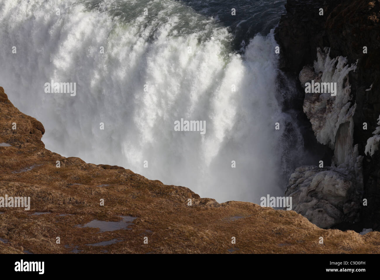 Gold and White: The Gullfoss Waterfall in Spring Stock Photo